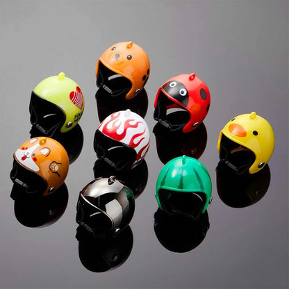 Small hard plastic helmet with elastic straps and sponge lining, designed for a chicken or bird to wear.