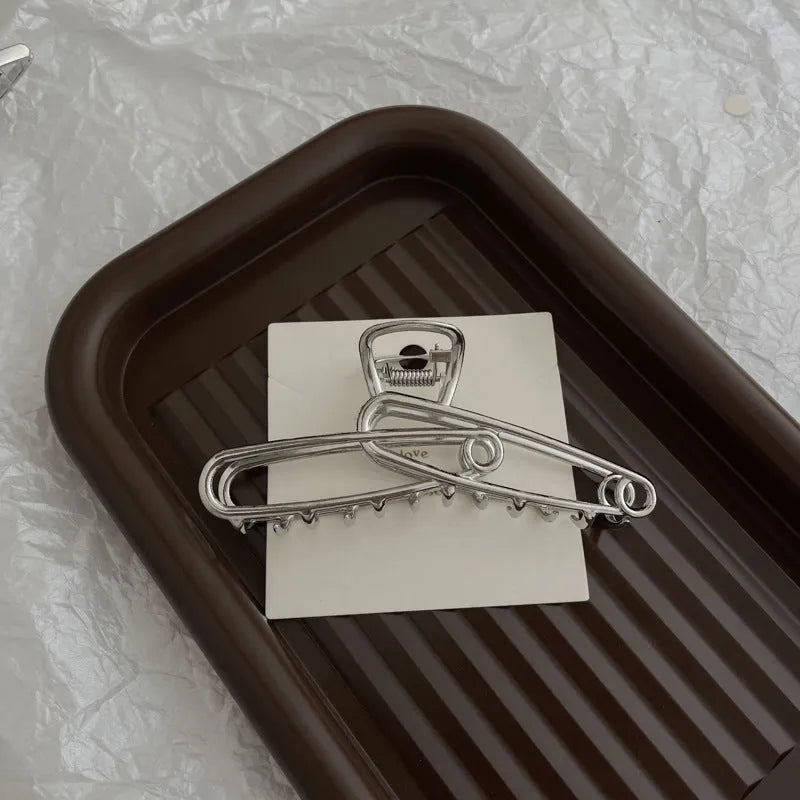 Silver metal hair claw barrette example from a range of 44 Korean-style designs.
