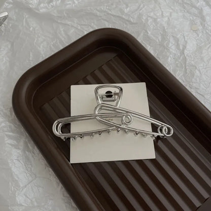 Silver metal hair claw barrette example from a range of 44 Korean-style designs.