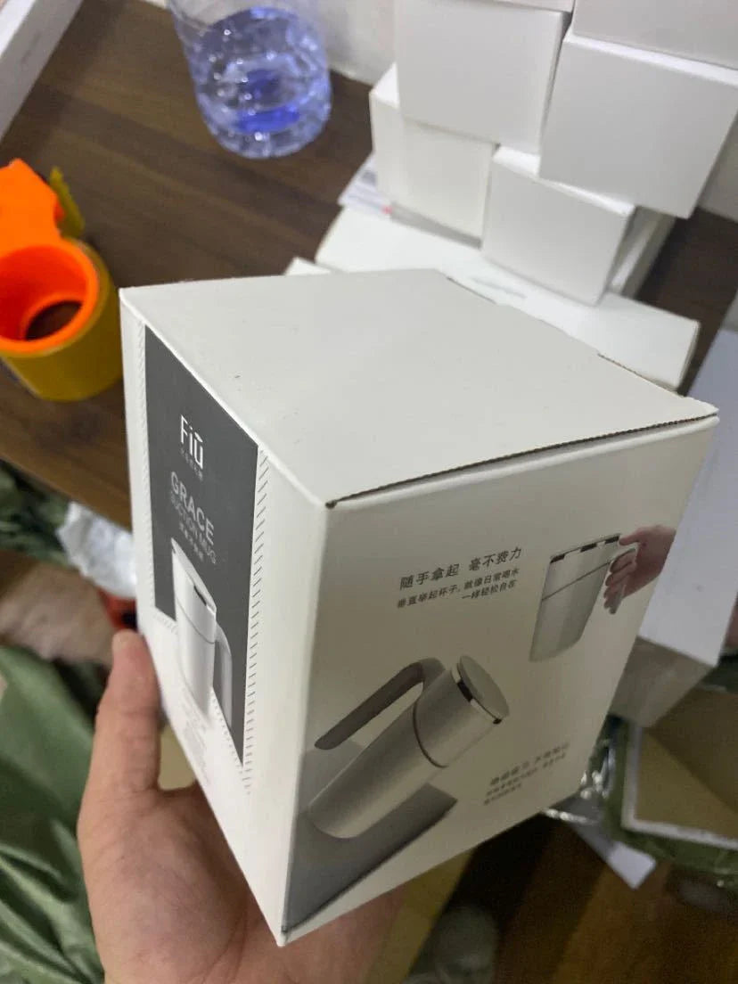 Elegant glass water bottle with suction cup in white color, designed for stable and spill-proof hydration on the go