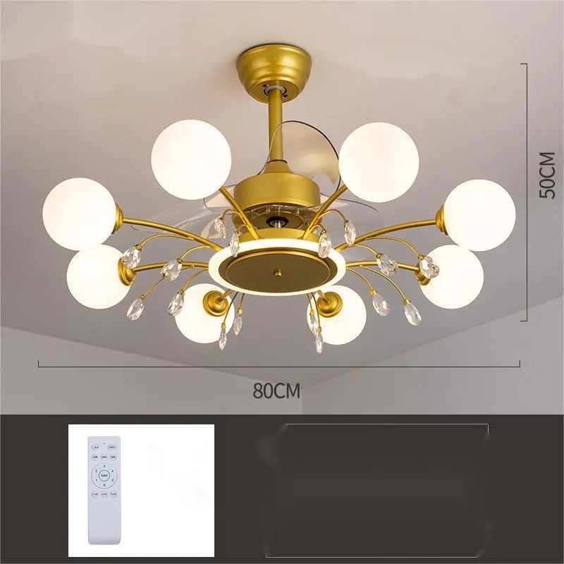 Black and gold ceiling fan lamp with acrylic shade and metal blades, shown with remote control.