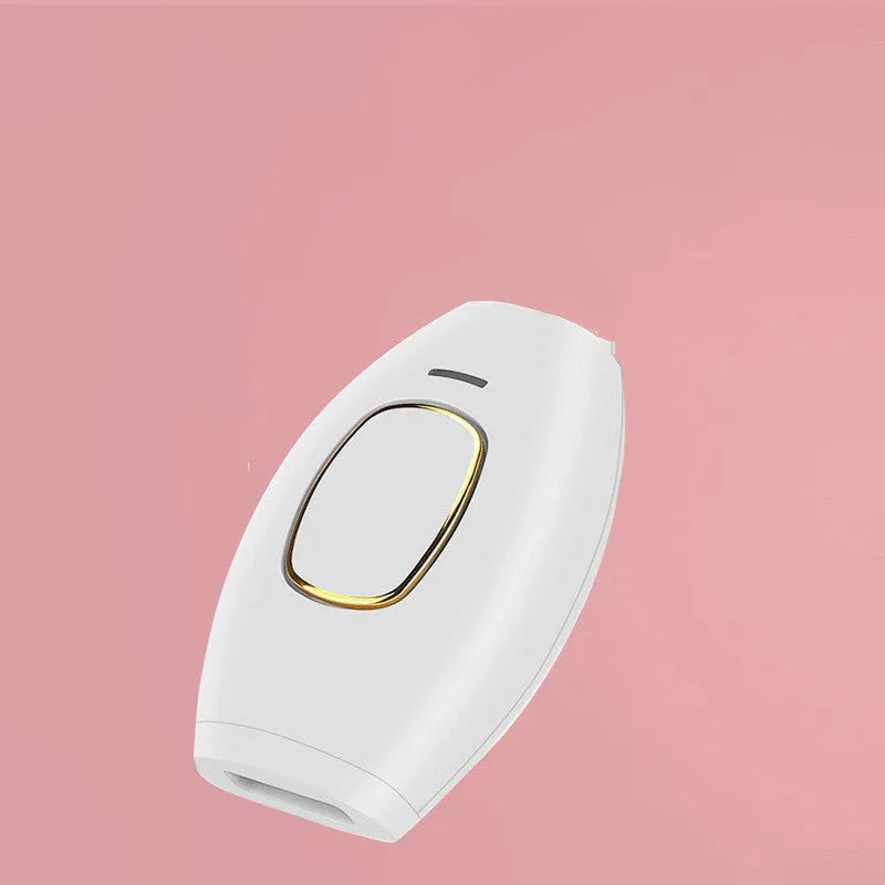 White laser hair removal device with shaver attachment and international power adapters