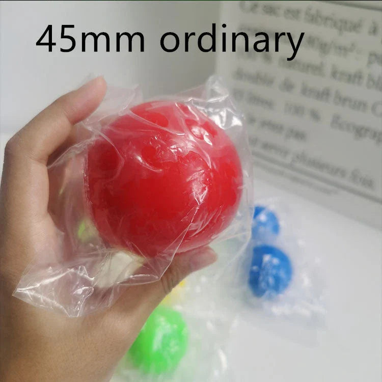 Colorful, luminous stress relief balls with a sticky surface for bouncing, squeezing, and sticking to surfaces