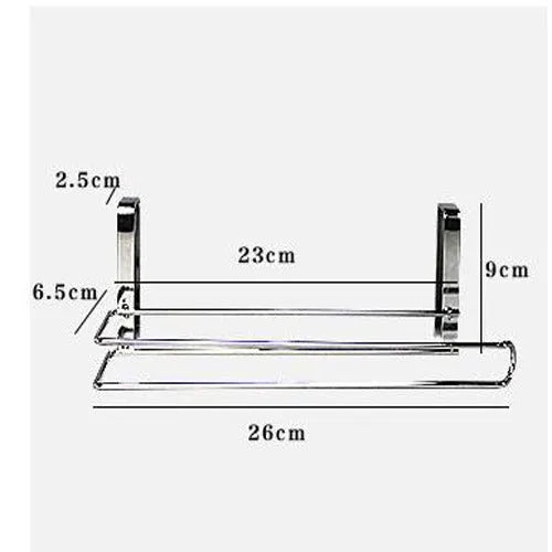 Silver stainless steel paper towel rack hanging on a cabinet door