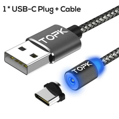 Magnetic 3-in-1 charging cable with Apple, Android, and USB-C plugs on a table