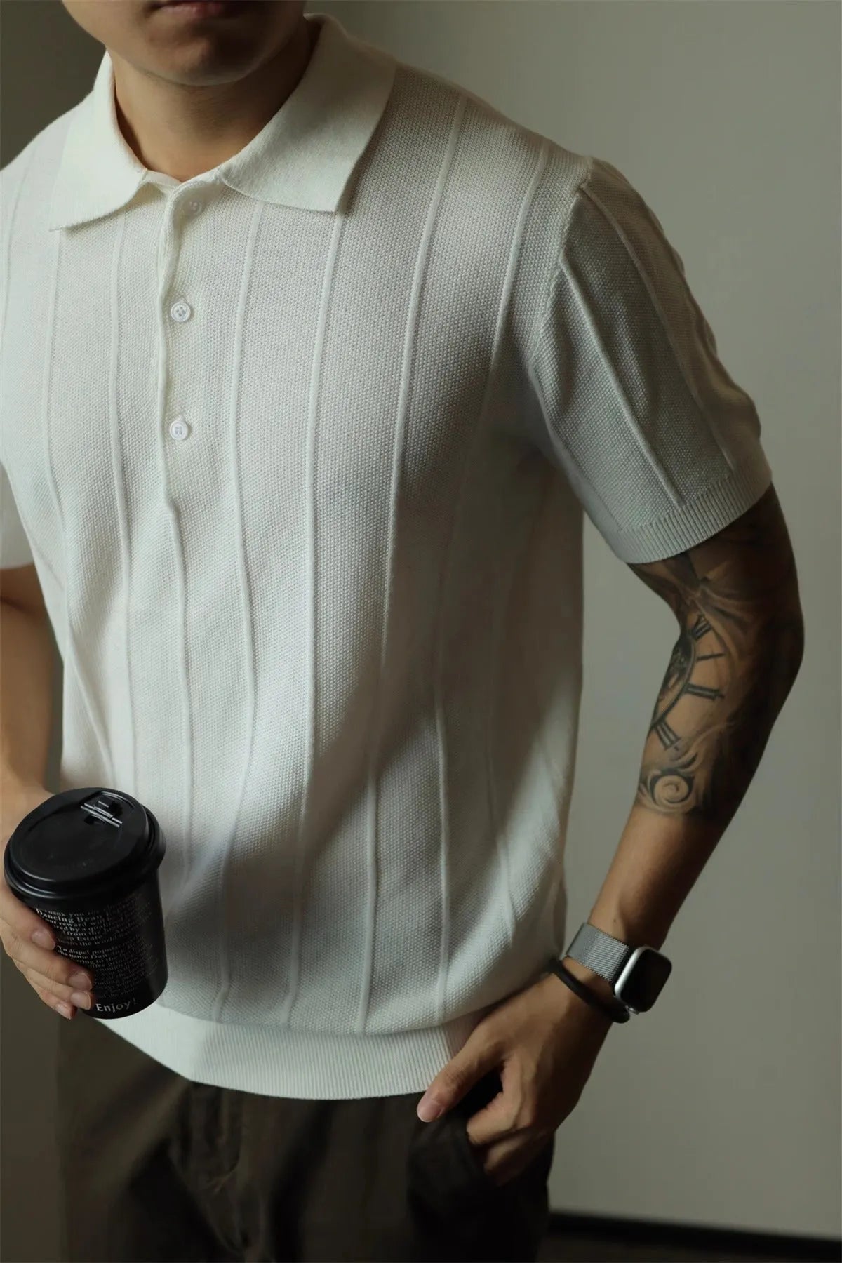 Men's solid black loose fit basic t-shirt made from polyester fabric, front view.