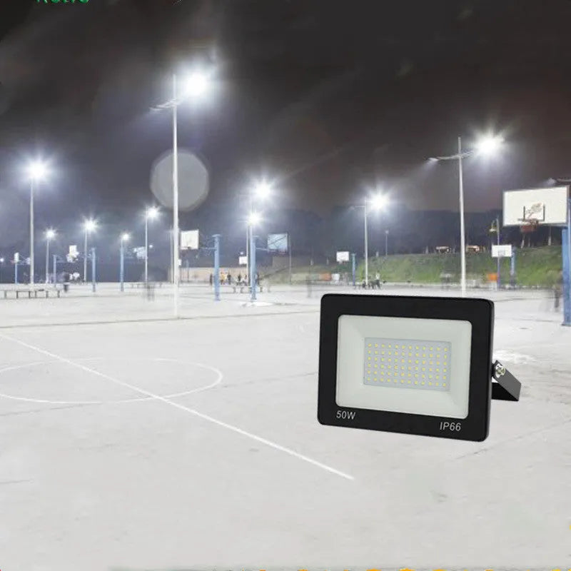 Black LED flood light with aluminium shell and glass cover, IP65 waterproof, 120° beam angle, 10W to 300W, cool white.
