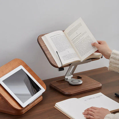 Walnut coloured solid wood adjustable reading rack with rotating base holding a book
