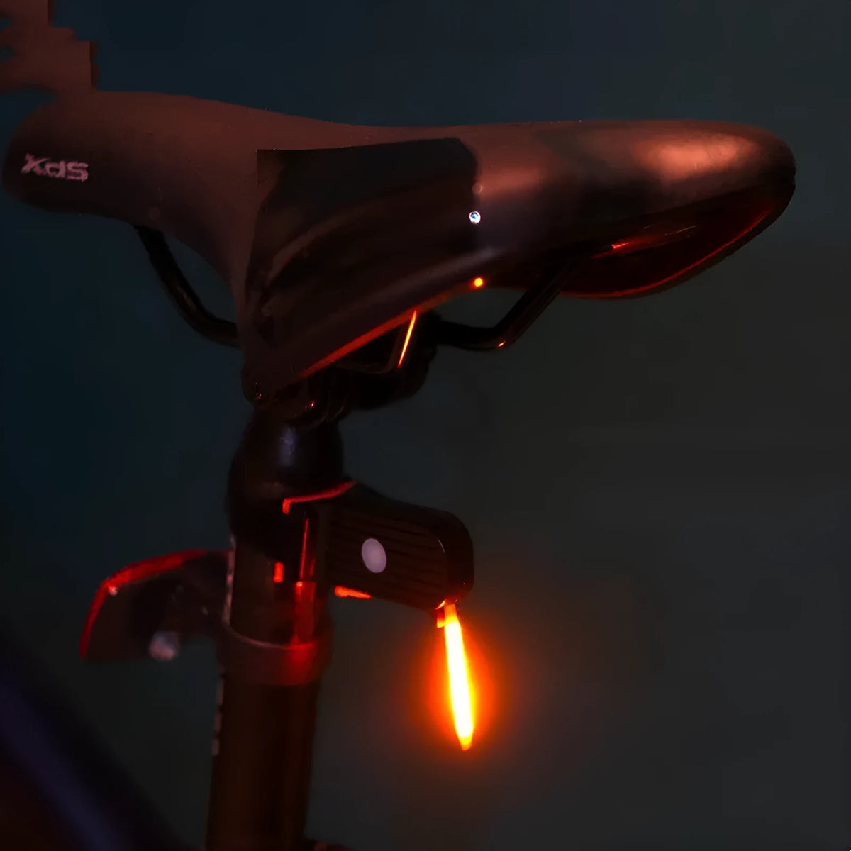 Waterproof USB rechargeable bicycle tail light in blue, pink, red, white, or yellow colours