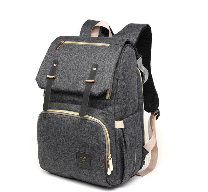 Stylish and functional diaper backpack with large capacity, stroller hooks, and USB charging port for modern parents