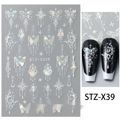 Assortment of black and silver nail sticker designs including cartoon and French tip patterns on a plastic sheet.