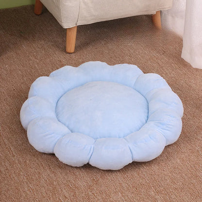 Blue, grey, pink, and yellow 50cm square plush pet bed with half-surrounded petal design.