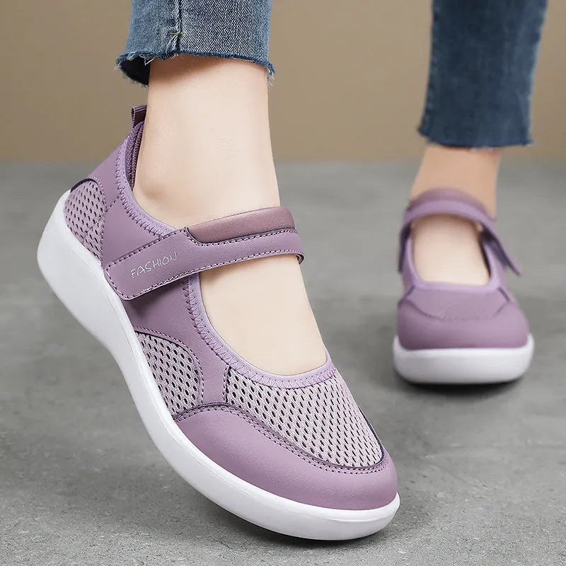 Women's breathable mesh casual shoes in black with Velcro closure and round toe design