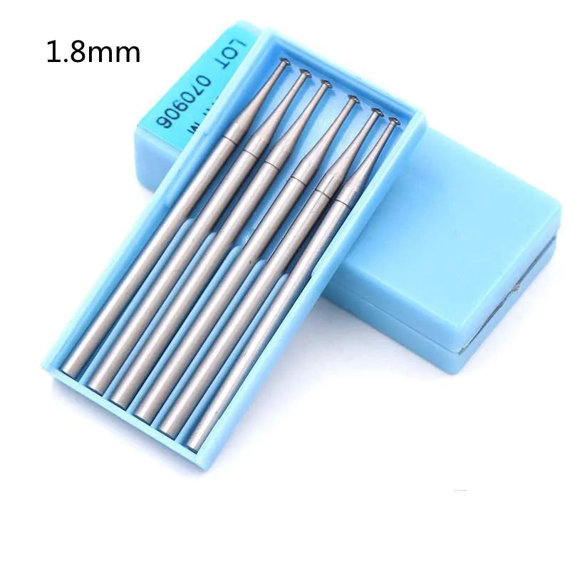 Blue box containing six tungsten steel carving milling cutter grinding heads with thin disc needle shapes and 2.35mm mandrels.