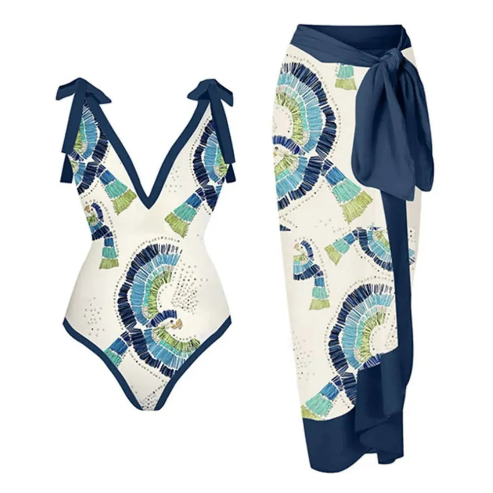 Blue French retro one-piece swimsuit with a detachable gauze skirt on a mannequin, backless design.