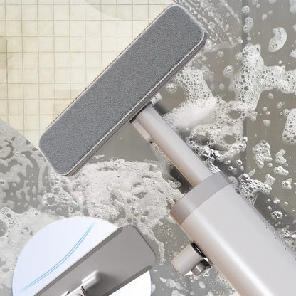 Rotatable self-squeeze mini mop with crevice brush attachment and microfiber pads for compact floor cleaning