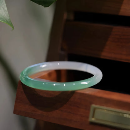 Chalcedony jade bracelet showing natural translucent stone with subtle colour variations