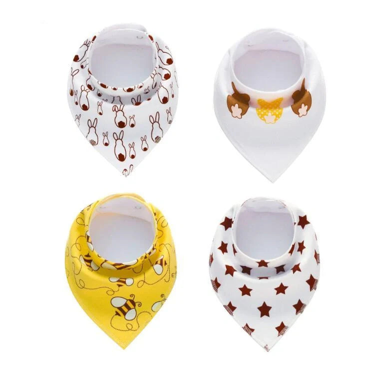 Set of four cotton baby bibs with arrow and wave designs for mess-free feeding