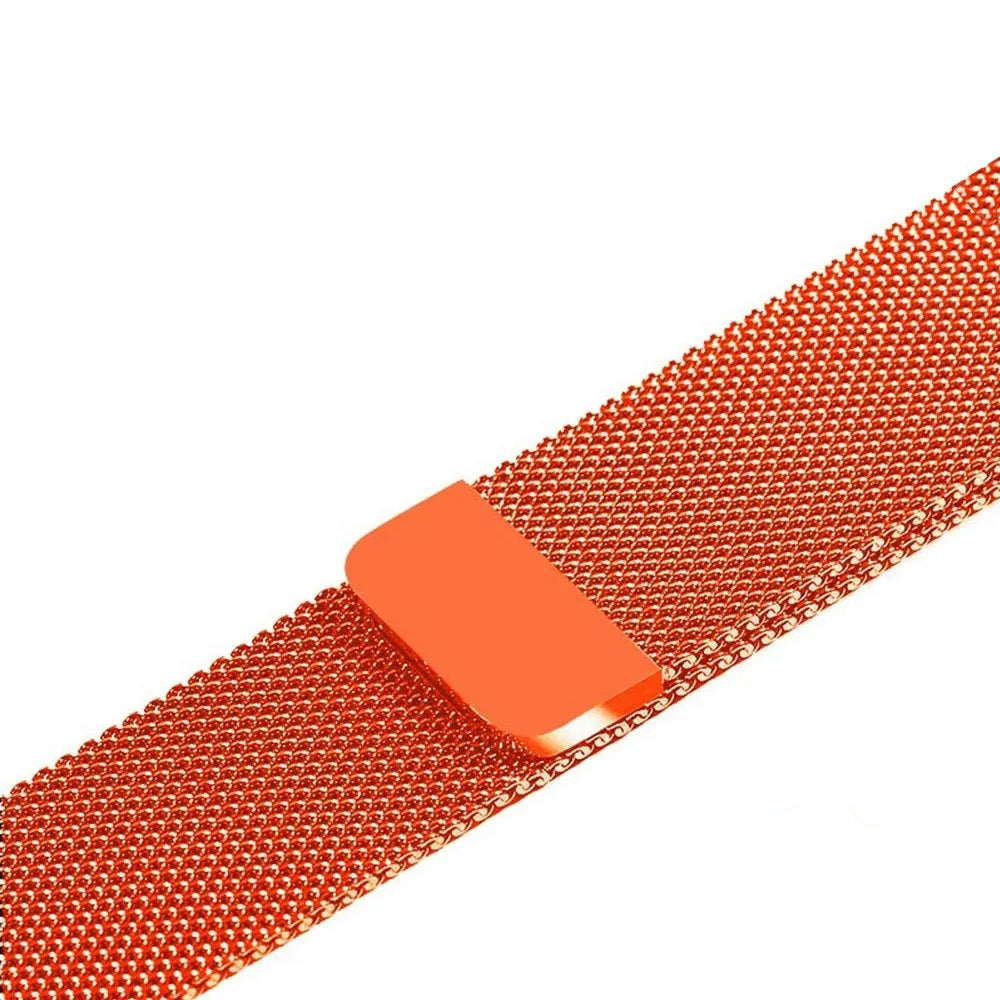 Stainless steel Apple Watch strap in silver on a wrist, showing the metal links and secure clasp.