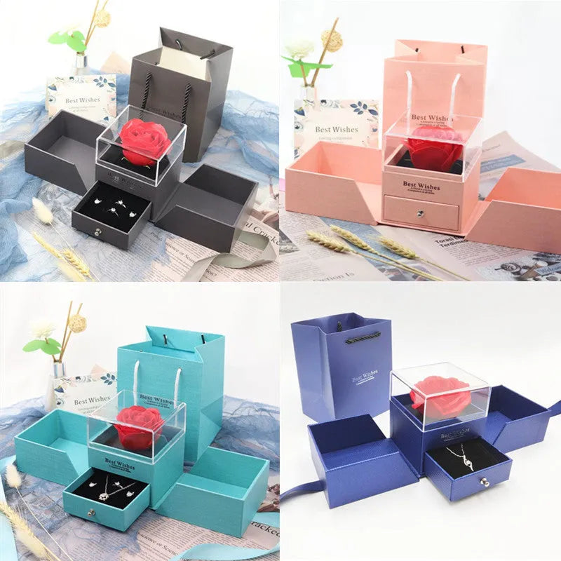 Cardboard jewellery gift box with inner packaging compartments, shown in pink colour.