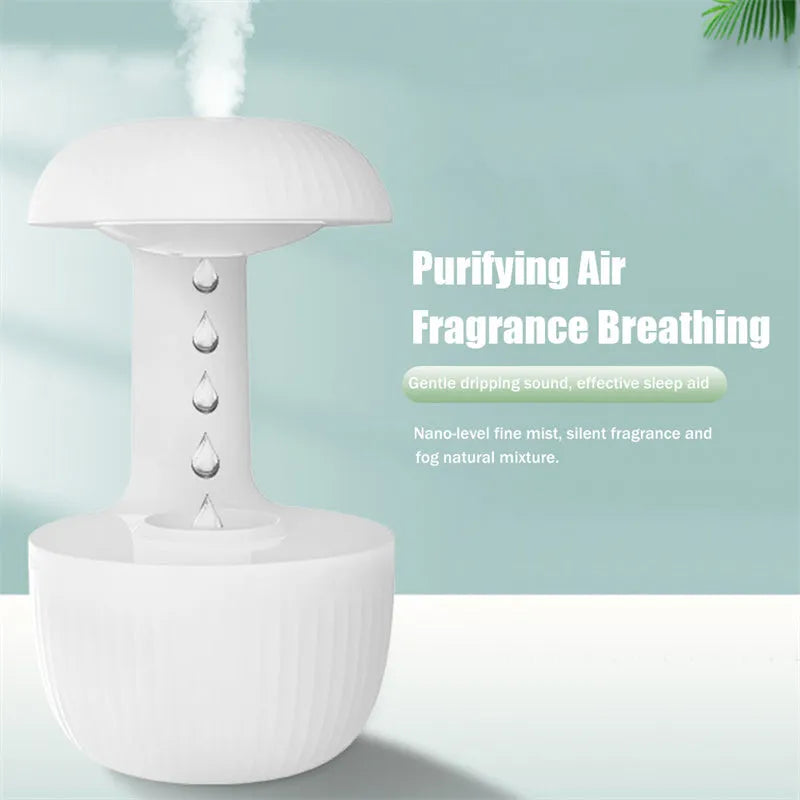 White anti-gravity humidifier showing water droplets appearing to levitate upwards from its base