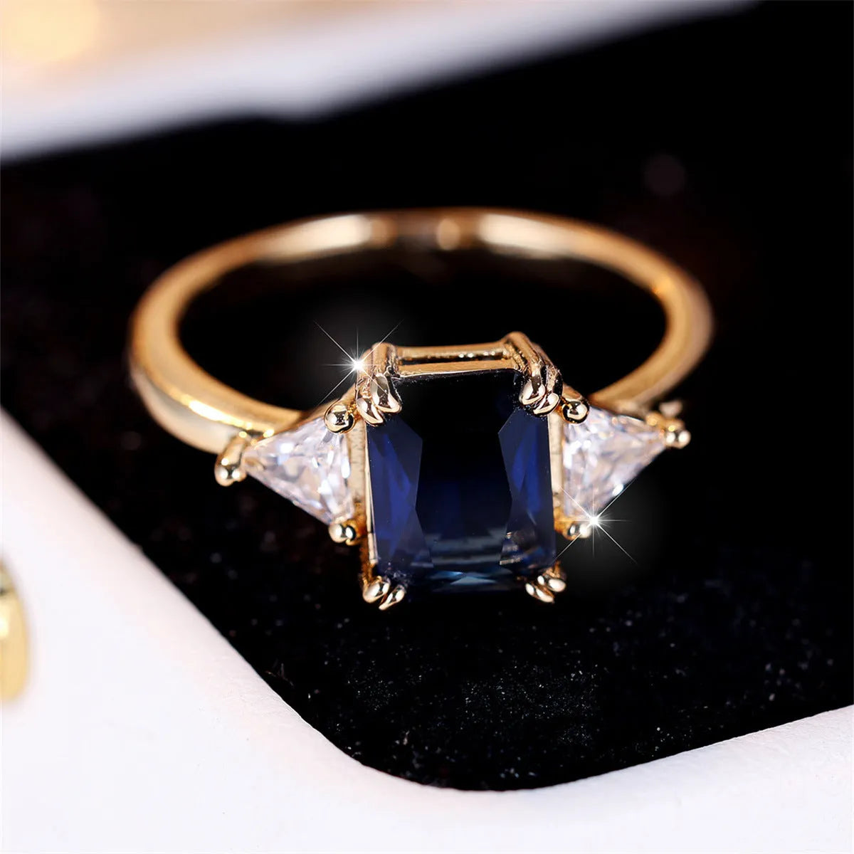 Rectangular women's fashion ring in gold sapphire blue copper with geometric design