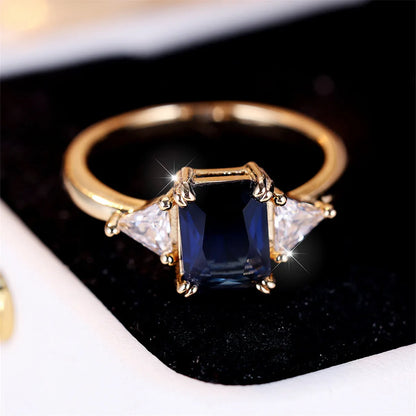 Rectangular women's fashion ring in gold sapphire blue copper with geometric design