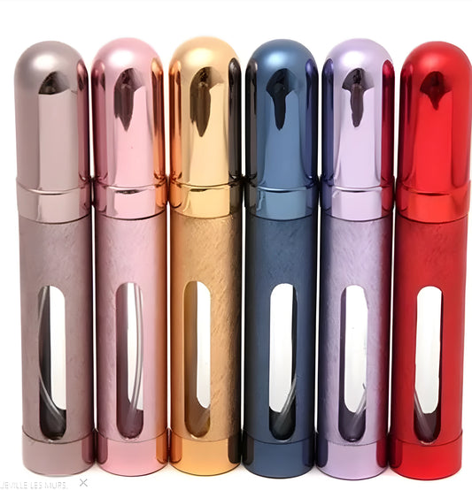 Slim 12ml aluminium travel perfume bottle with glass liner in bullet shape, shown in various colours.