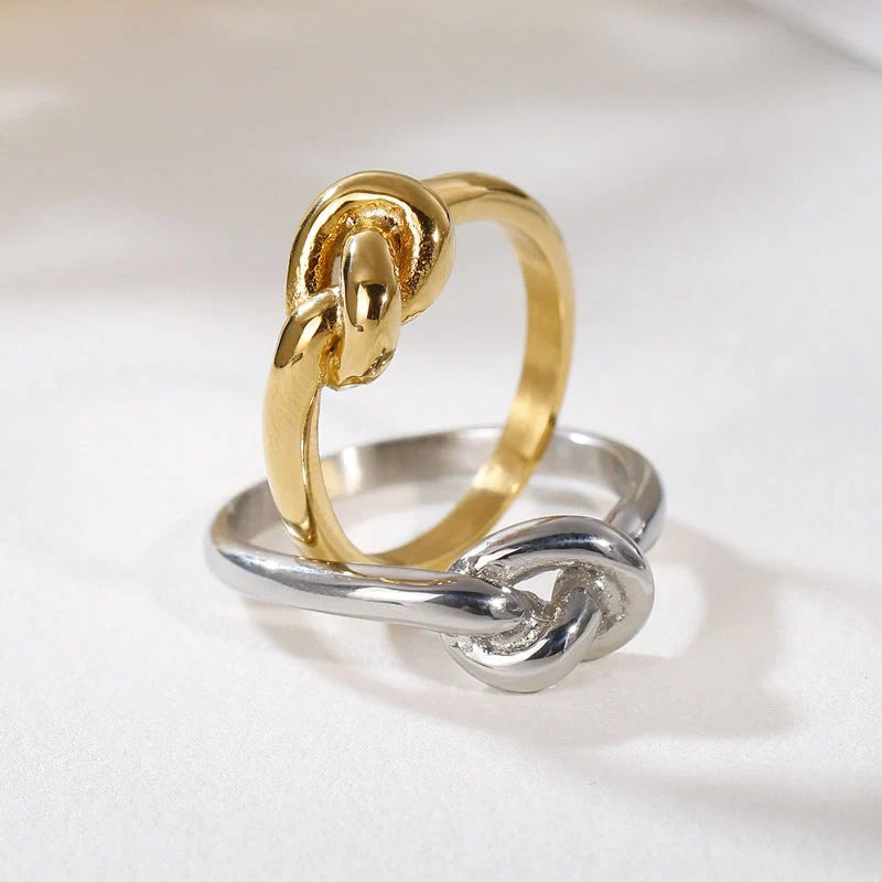 Elegant Truelove Knot Titanium Steel Ring in gold and rose gold finishes