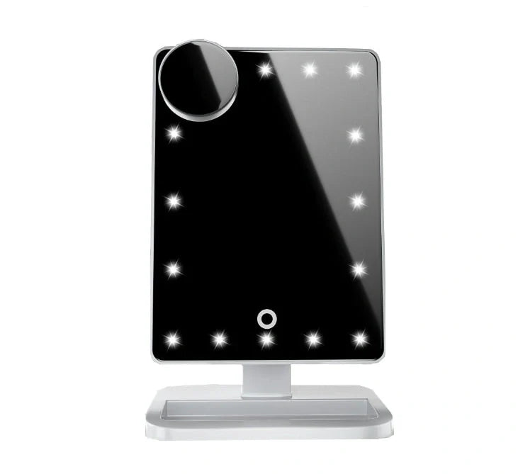 Pink touch screen makeup mirror with LED lights and Bluetooth speaker showing 10X magnification section
