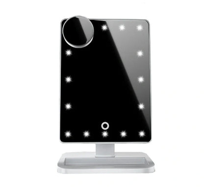Pink touch screen makeup mirror with LED lights and Bluetooth speaker showing 10X magnification section