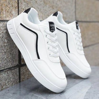 Korean trendy wild sneakers in black and white, low-top design with mesh lining and rubber sole.