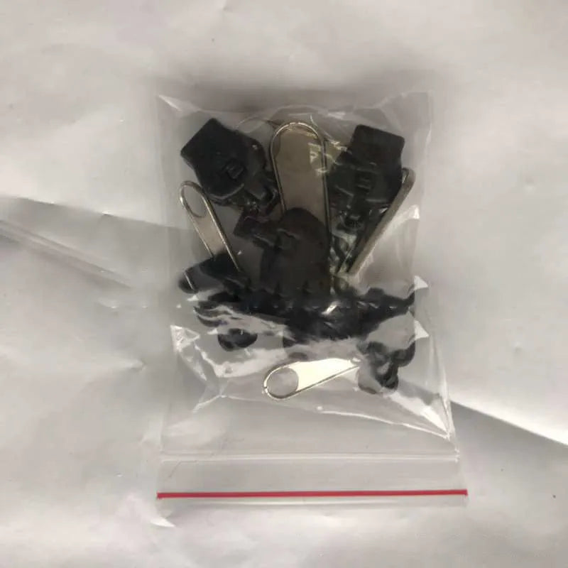 12-piece zipper head replacement kit in black, grey, and brown colours with snap-on installation