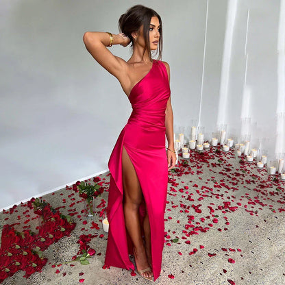 Chic one-shoulder backless slit dress in various colors, including red, apricot, rust, royal, wine red, and more.