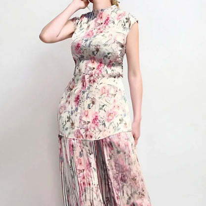 Long sleeve printed chiffon dress with high waist, showing skirt and top as a two-piece set in picture colour.