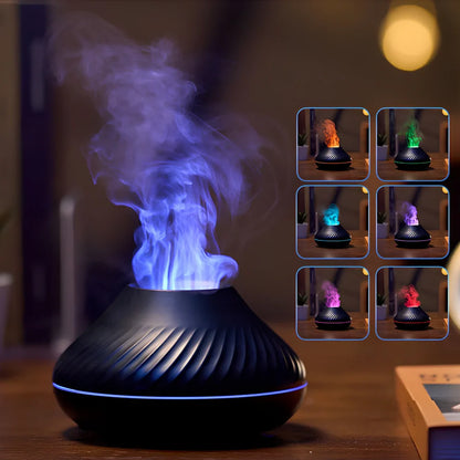 Black RGB flame aroma diffuser 130ml showing 3D colourful volcano mist effect on table