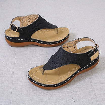 Comfortable women's wedge sandals in various colors with adjustable straps and a lightweight sole