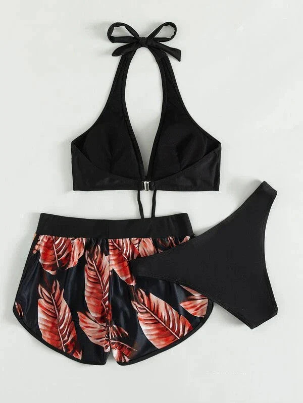 A stylish 3-piece leaf print bikini set with matching shorts, available in a variety of vibrant colors and patterns