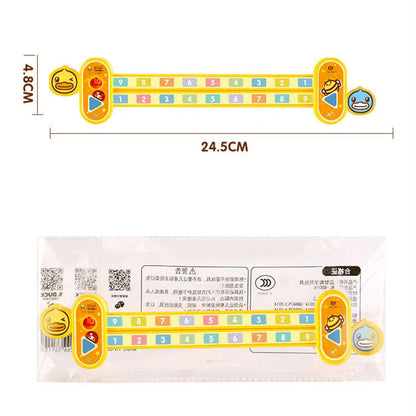 Yellow plastic cartoon digital decomposition ruler for children, measuring 24.5 cm