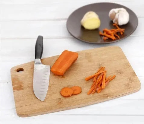 Kitchen cutting board made from natural Moso bamboo with antibacterial protection, measuring 28 x 17 x 1cm and weighing 305g, a square food preparation surface for safe chopping and slicing