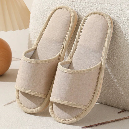 Women's open-toe linen slippers with thick sole in light brown colour.