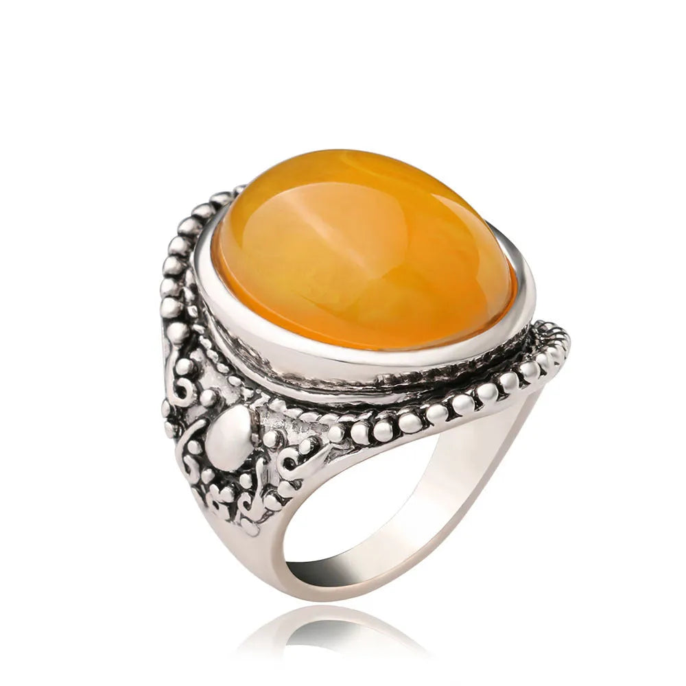 Retro geometric alloy ring with antique silver electroplating and fluorescent beeswax amber detail