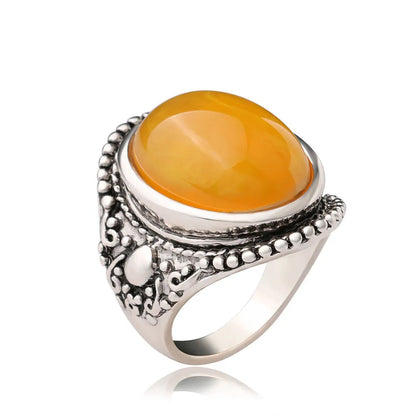 Retro geometric alloy ring with antique silver electroplating and fluorescent beeswax amber detail