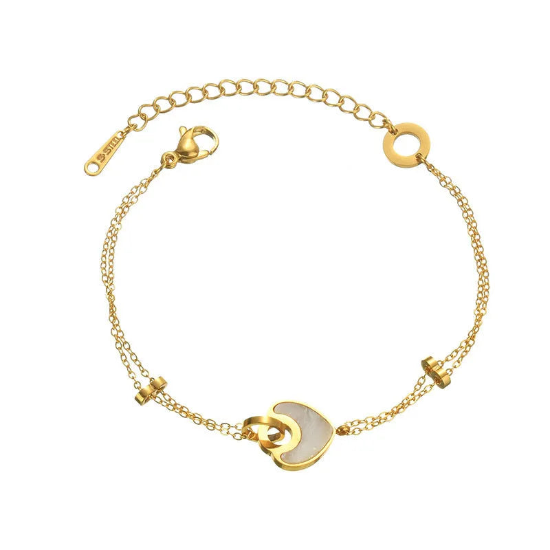 Women's stainless steel bracelet with double-layered heart design and resin accents, showing adjustable clasp and electroplated finish