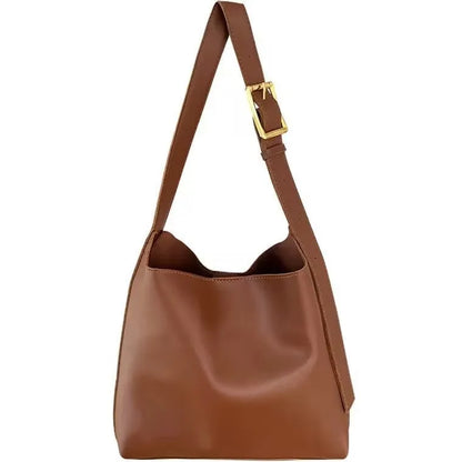 Women's soft PU shoulder bag measuring 28cm by 32cm by 12cm with swing thread details