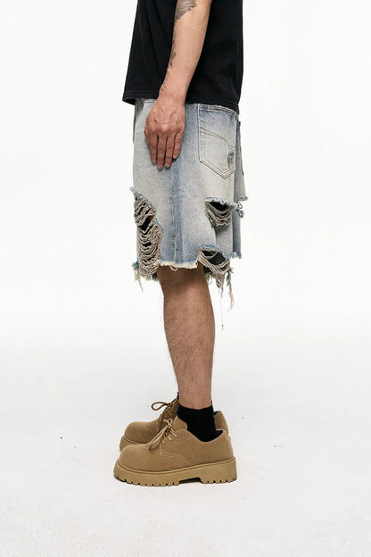 Men's light blue baggy denim shorts with retro washed finish and wide leg cut