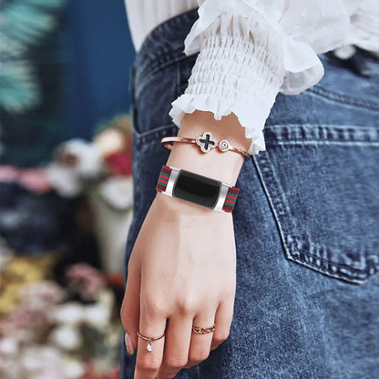 Printed elastic watch strap compatible with Fitbit Charge 6 shown in adjustable position