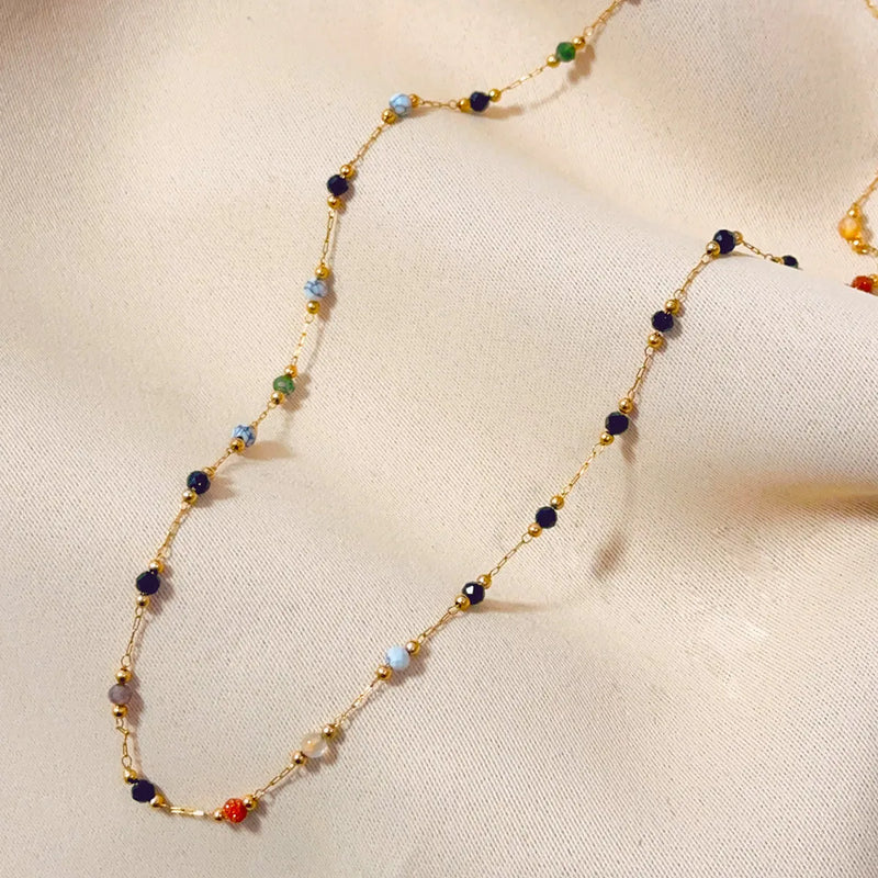 Women's necklace made from titanium steel with a retro simple design and a natural stone pendant featuring an O-ring chain style presented in a gold electroplated finish suitable for female wearers.