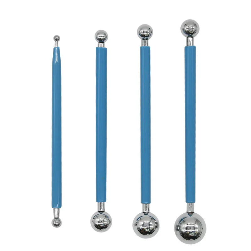 Pottery tool set with acrylic, stainless steel and plastic tools in a blue canvas roll