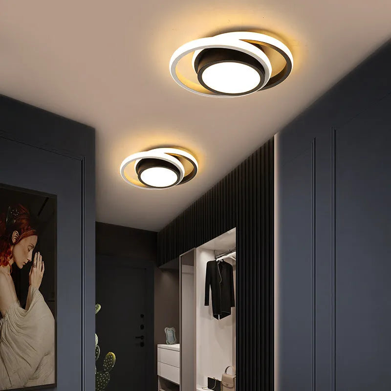Modern geometric aluminium ceiling light in round and square styles with LED illumination.